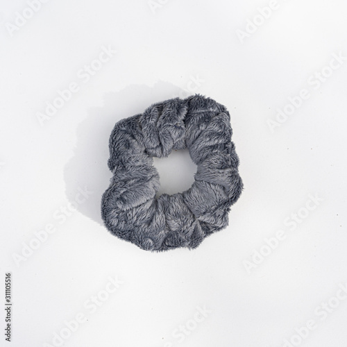 Grey scrunchie on white background