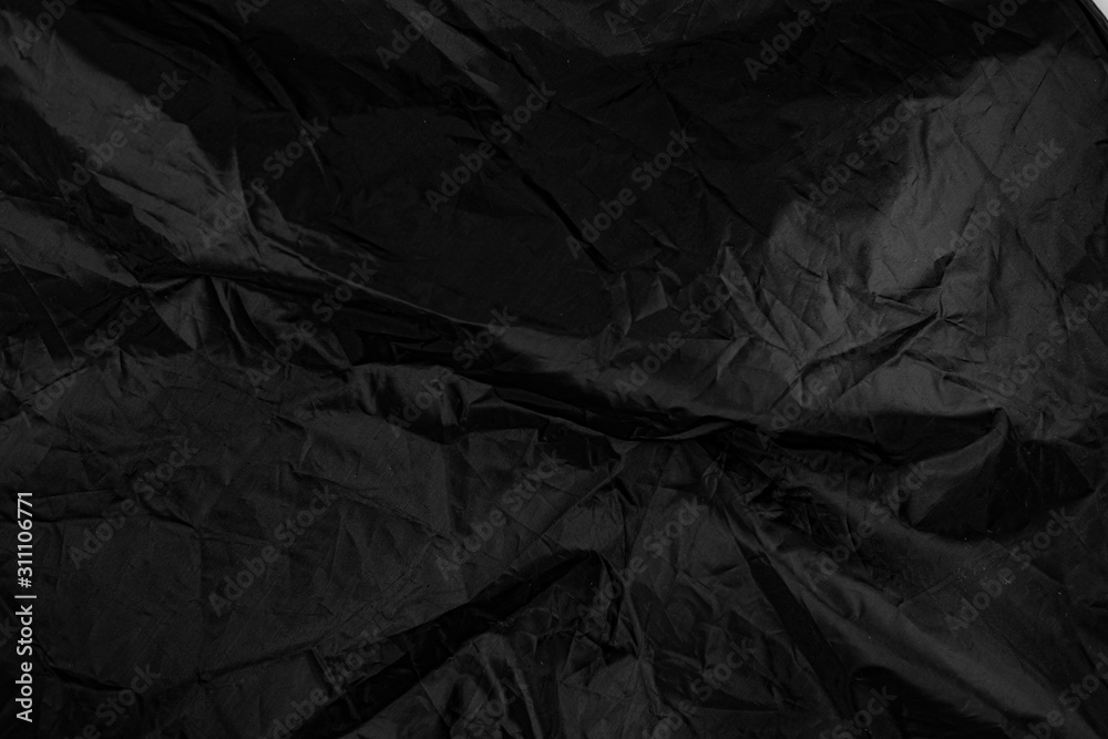 Dark satin material texture. Creative background. Dark satin material texture. Creative background.
