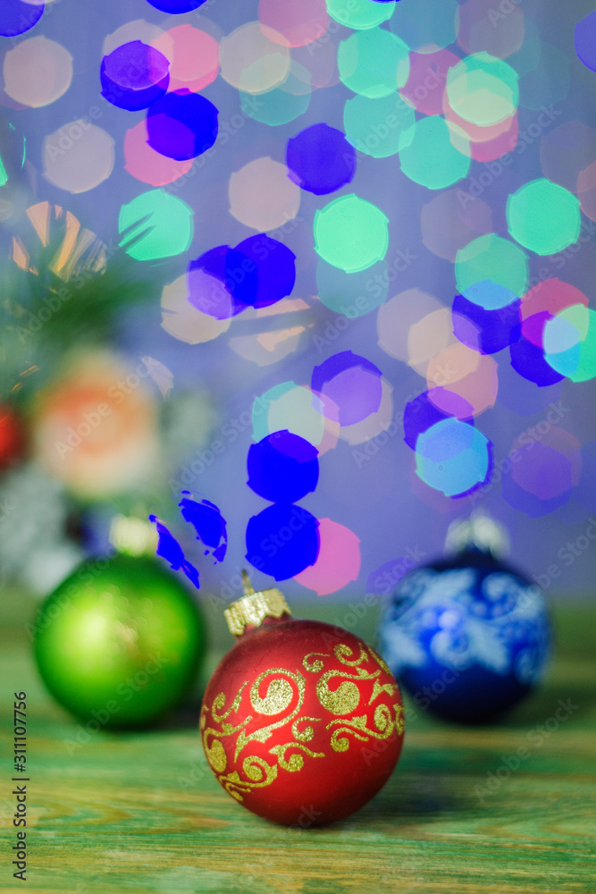 Fototapeta premium christmas decoration, Christmas balls against bokeh background