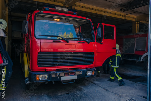 Fire engine inside the garage of the fire department