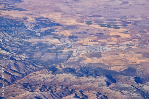 Colorado Rocky Mountains Aerial view from airplane of abstract Landscapes, peaks, canyons and rural cities in southwest Colorado and Utah. United States of America. USA. © Jeremy