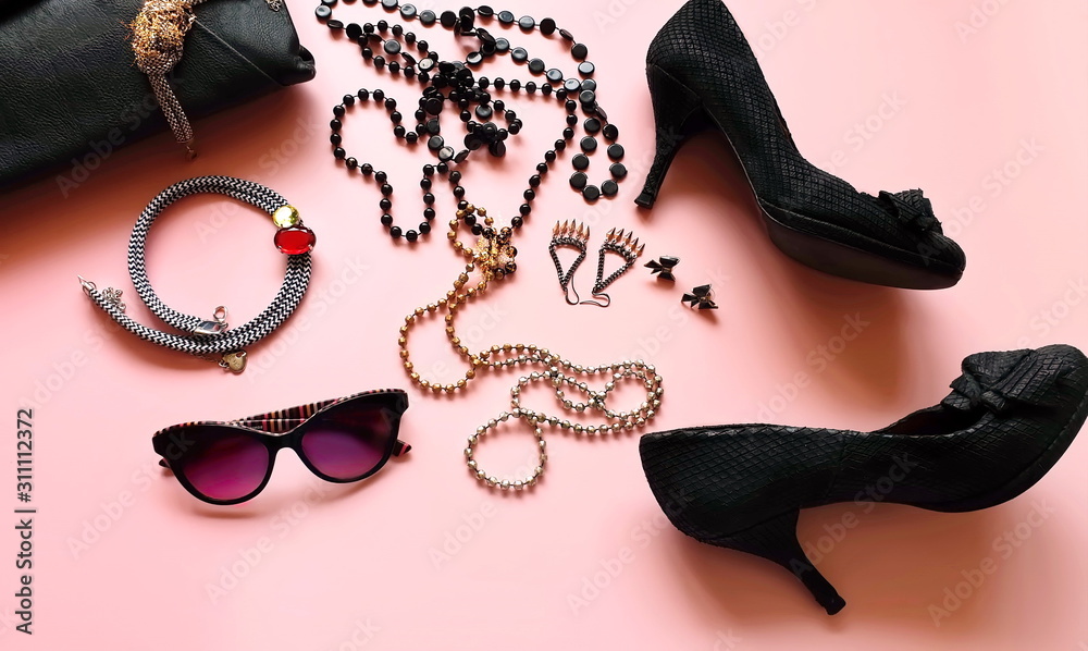 fashon luxury women shoes black on high heels and black leather clutch bag fashion pink leather handbag and summer stylish shoes living coral jewelry rings earrings background concept Women clothes St...