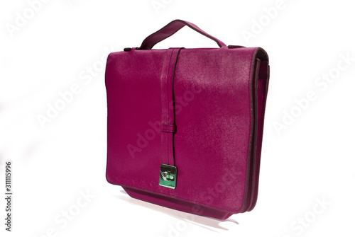 A pink woman leather bag on a white background.(with Clipping Path).