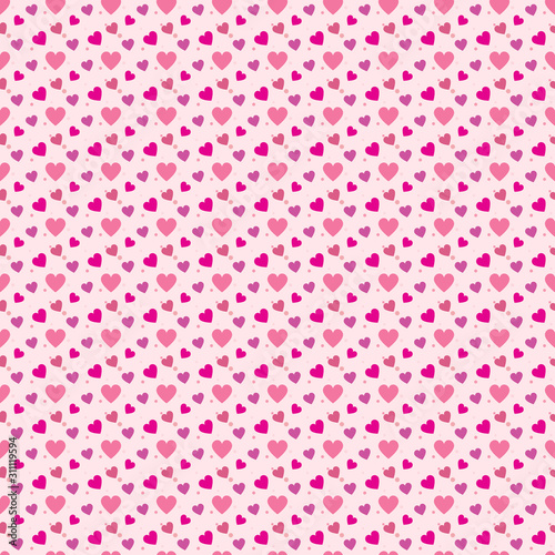Pink heart and polka dot seamless pattern background.