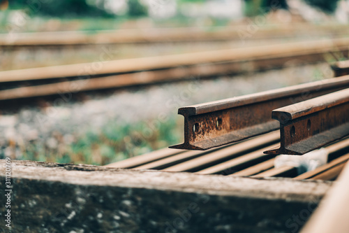 Close up rusty rails for railway construction,stack of metal rusty photo