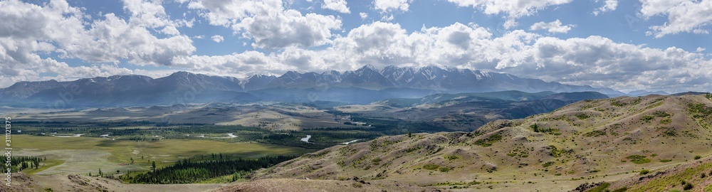 Mountain Altai panoramic view of the North Chuy ridge and the river Chuya flowing in the valley