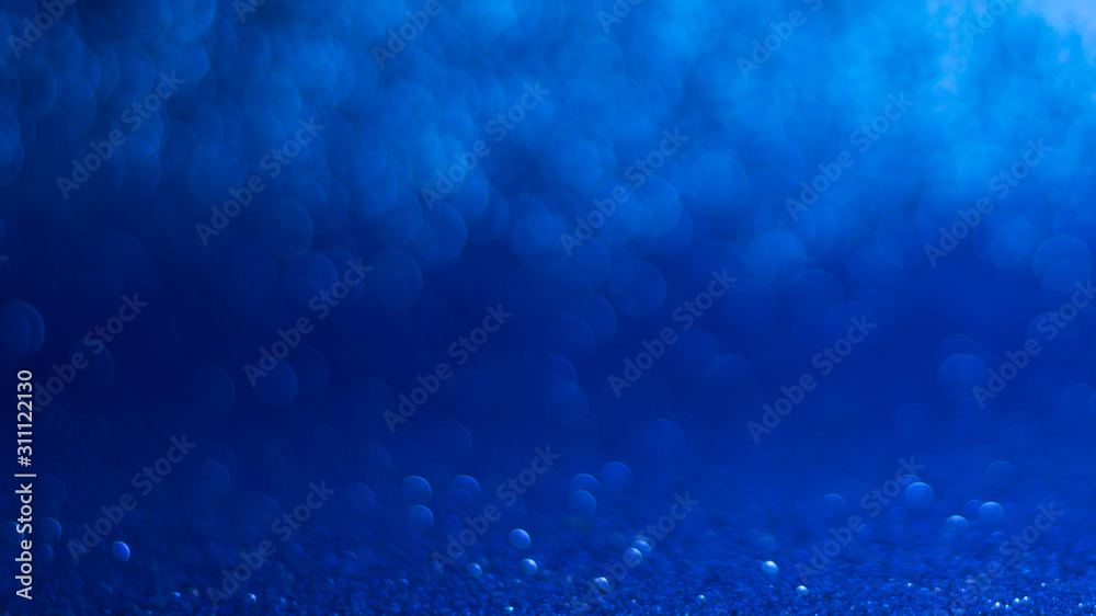 Naklejka premium abstract background with blue bokeh, lights and shadow.