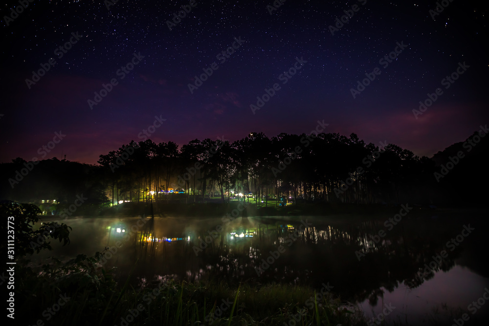 Landscape with Stars night sky at Pang Ung lake, Mae Hong Son province, Thailand.