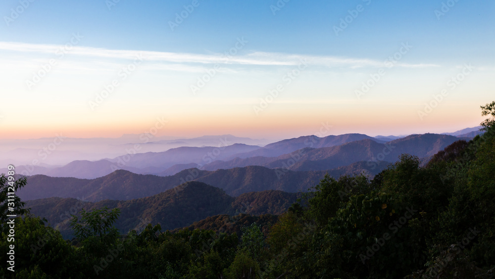Beautiful sunset over the mountain range at Ken Fin viewpoint ,Chiang Mai, Thailand