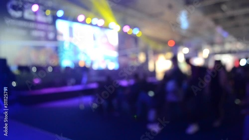 Wallpaper Mural Blurred background large screen stage many people multicolored Torontodigital.ca