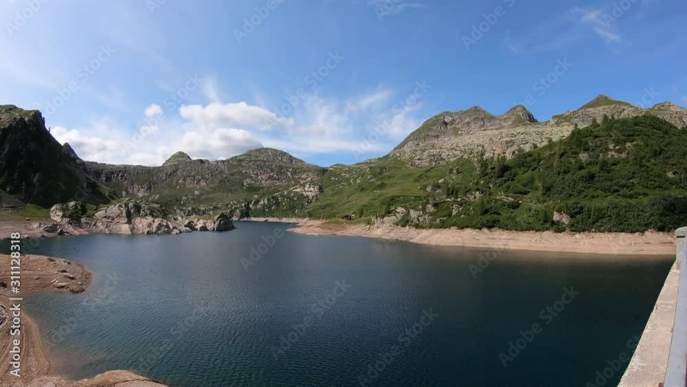 Carona, Bergamo, Italy. View of the lake Gemelli in summer time, an artificial mountain lake. Italian Alps. Orobie Carona, Bergamo, Italy. View of the lake Gemelli in summer time, an artificial mountain lake. Italian Alps. Orobie