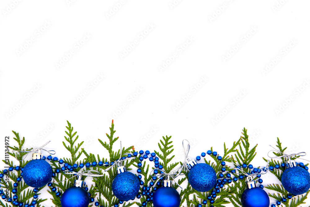Christmas composition on a blue sheet with a Christmas balls and star Christmas composition on a blue sheet with a Christmas balls and star