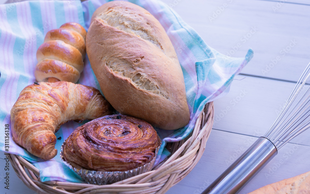 Fresh bread on wooden table background. Top view with space for your text. Fresh bread on wooden table background. Top view with space for your text.