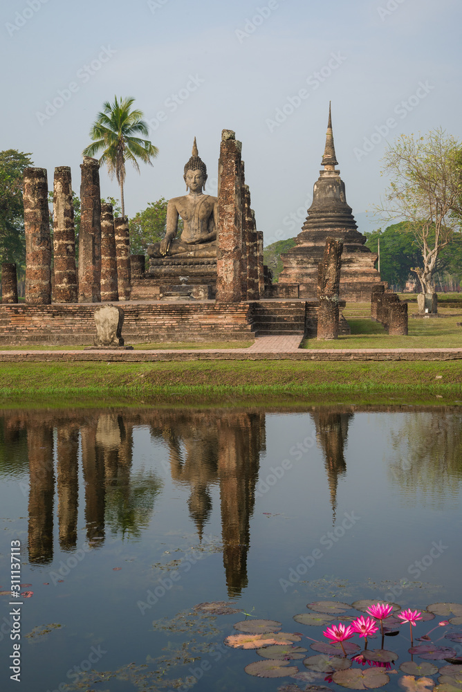 View of the ruins of the ancient Buddhist temple Wat Chana Songkram on a cloudy day. Sukhothai, Thailand View of the ruins of the ancient Buddhist temple Wat Chana Songkram on a cloudy day. Sukhothai, Thailand