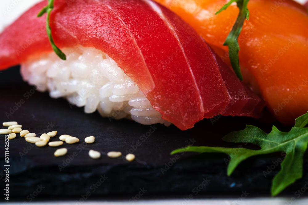 fresh sashimi with green on wooden table fresh sashimi with green on wooden table