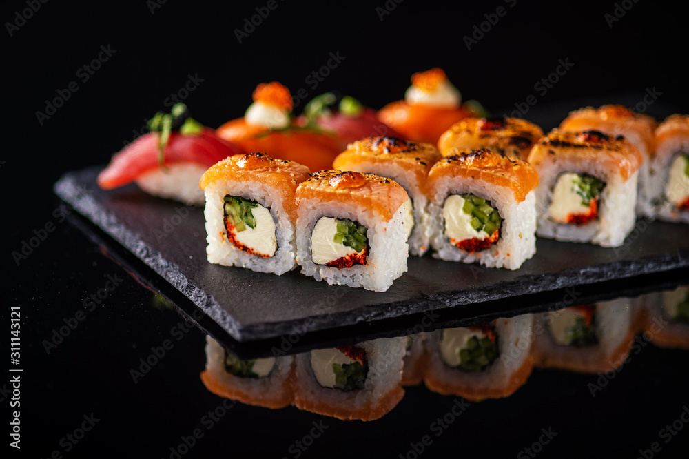 fresh sashimi with green on wooden table fresh sashimi with green on wooden table
