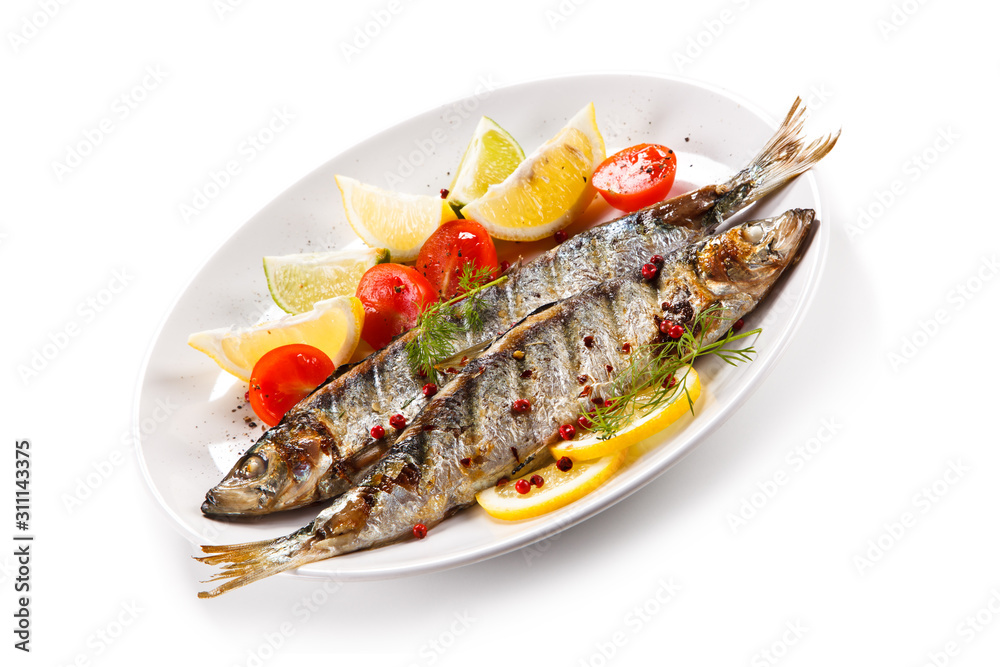 Fish dish - grilled herrings with vegetables