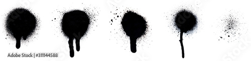 Close-up of several black spray paint spots, splashes and drips, isolated on white background. photo