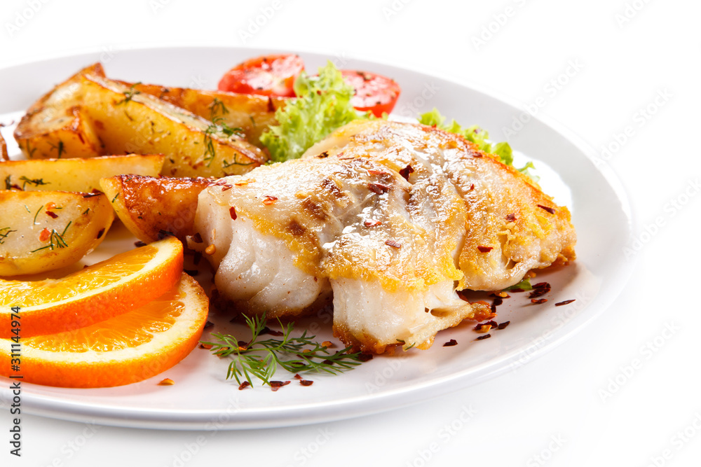 Fish dish - grilled herrings with vegetables Fish dish - grilled herrings with vegetables