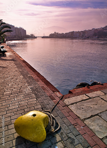 Wallpaper Mural Yellow cordage point, Chalkida city harbor in Evia island, Greece, sunset time. Wide angle view. Torontodigital.ca