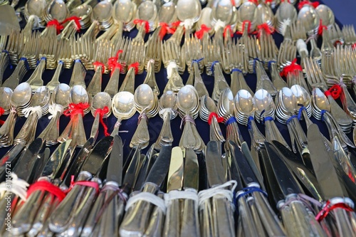 Vintage silverware at a French antiques market