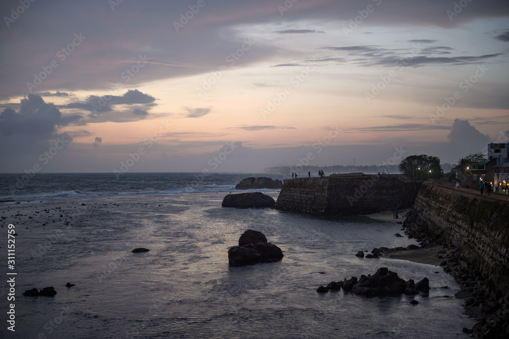 The city wall at the waterfront of the Indian ocean in the historic city Galle, Sri Lanka
