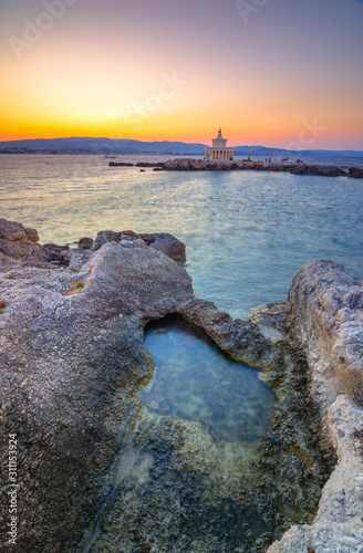 Stunning view of the Lighthouse of Saint Theodore in Kefalonia island, Greece photo