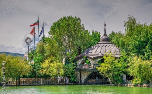 Gazebo by the pond near the Ravadinovo castle in Bulgaria photo