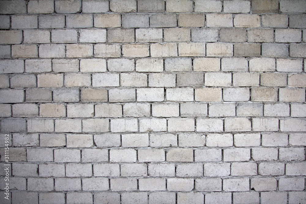 Light Grey Brick Wall Background or Backdrop