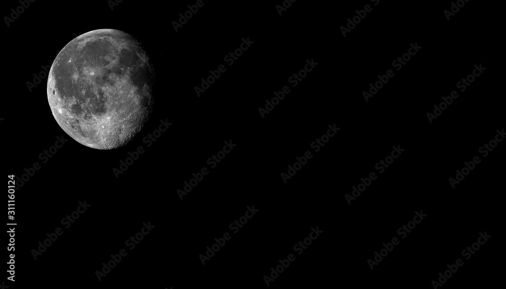 Obraz premium The Moon is the Earth's largest natural satellite and can be seen in the night sky.