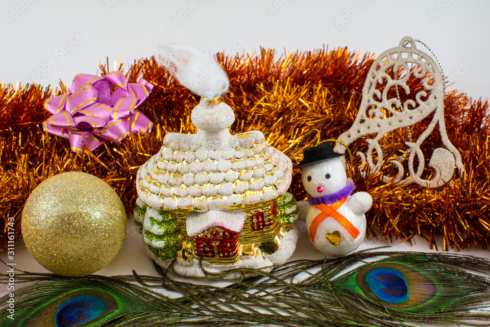Yellow ball and christmas toys on a white background