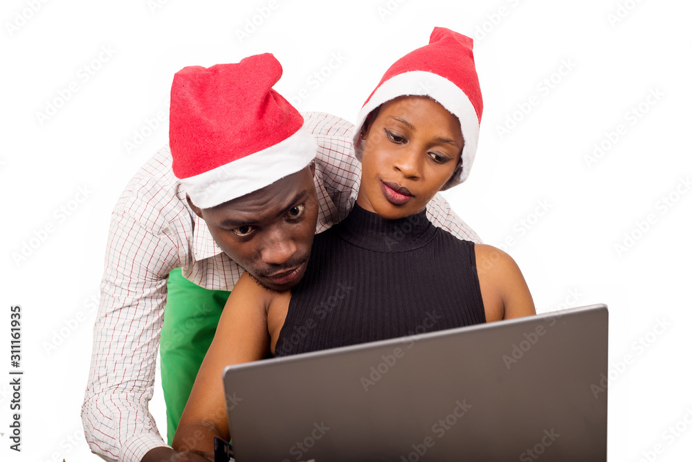 a young couple with laptop. a young couple with laptop.