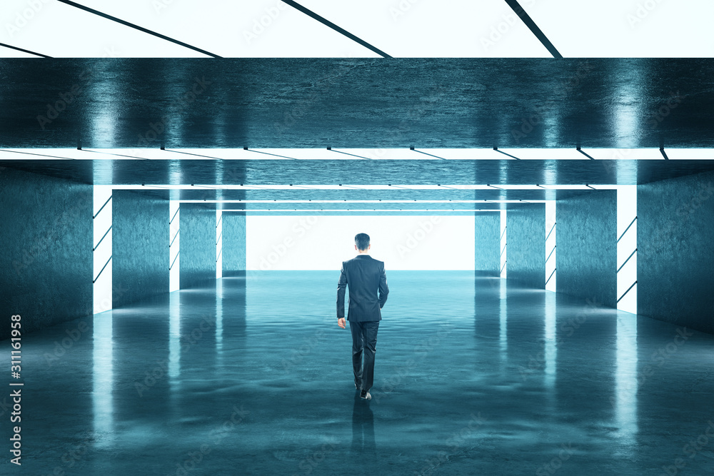 Businessman walking in gallery interior Businessman walking in gallery interior