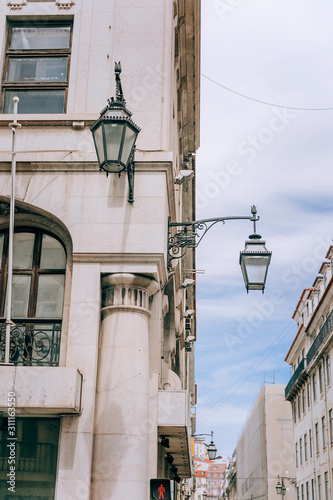 Lanterns on the buildings of Lisbon. Portugal.