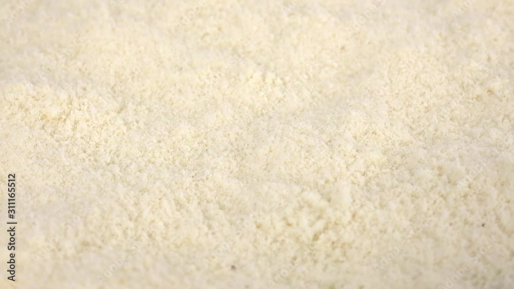 Coconut flour rotating on a plate (seamless loopable) Coconut flour rotating on a plate (seamless loopable)