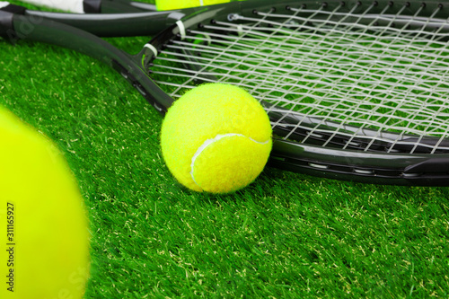Tennis balls on grass close up. Tennis equipment