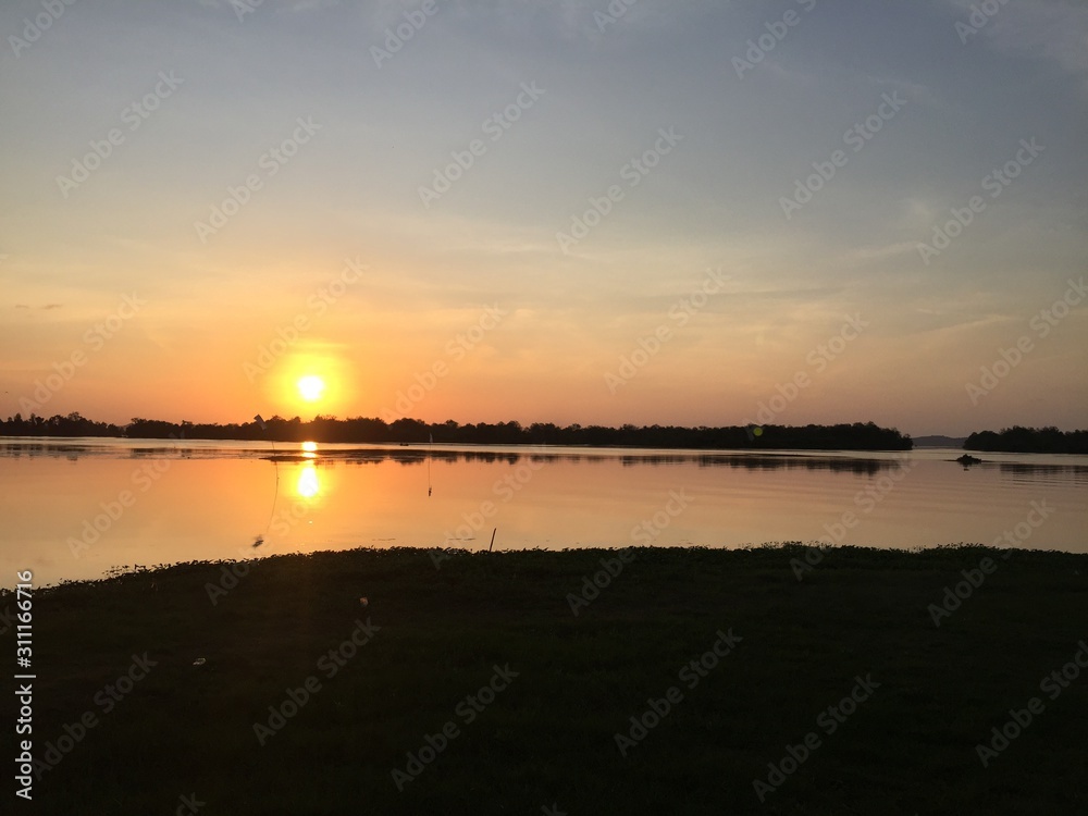 sunset on lake in evening