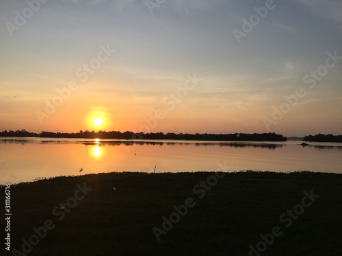 sunset on lake in evening