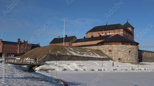 Ancient fortress of Hameenlinna close-up on a Sunny March day. Finland photo