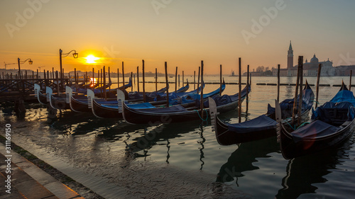 Sunrise at Venice with gondola and island of st george view © k_samurkas