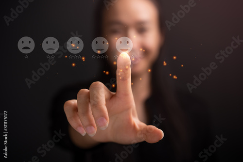 Εκτύπωση καμβά Businesswoman pressing smiley face touch screen