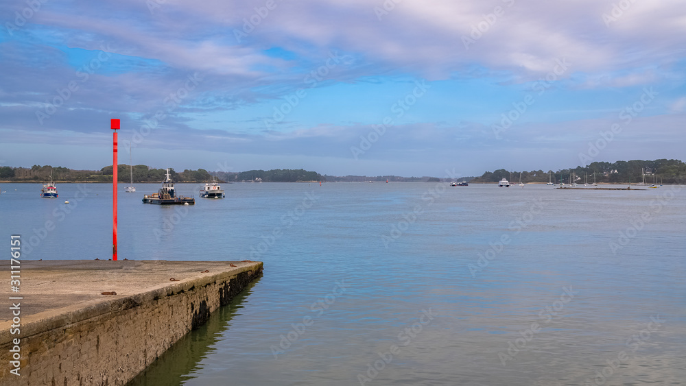 Brittany, Port-Blanc, Baden, the pier to go to the Ile aux Moines island in  the Morbihan gulf Stock Photo | Adobe Stock