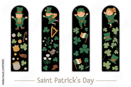 Vector Saint Patrick’s Day set of bookmarks for children. Cute leprechaun, fairy, shamrock on black background. holiday themed vertical layout card templates. Stationery for kids..