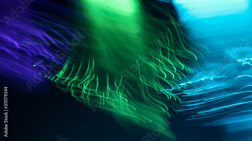 Blur the bokeh from the tree. LED lights use line drawing methods to create color, shape.