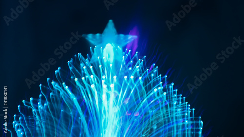 Blur the bokeh from the tree. LED lights use line drawing methods to create color, shape.