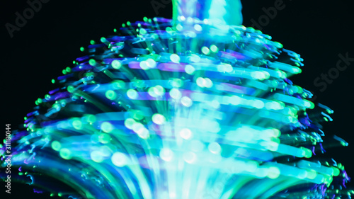 Blur the bokeh from the tree. LED lights use line drawing methods to create color, shape.