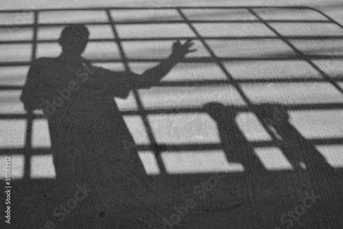 The shadow of human apper on the street. photo