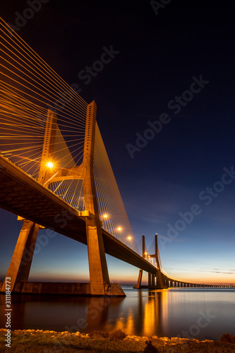 bridge Vasco da Gama in Lisboa, Portugal to the sunrise