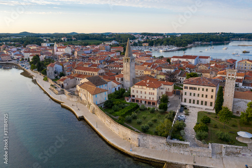 Fragment of the waterfront of the old city close-up. Porec, Croatia. Shooting from a drone. © ROMAN DZIUBALO