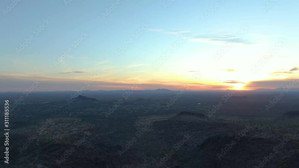 Slow motion panning over the Arizona desert landscape during sunset. Slow motion panning over the Arizona desert landscape during sunset.